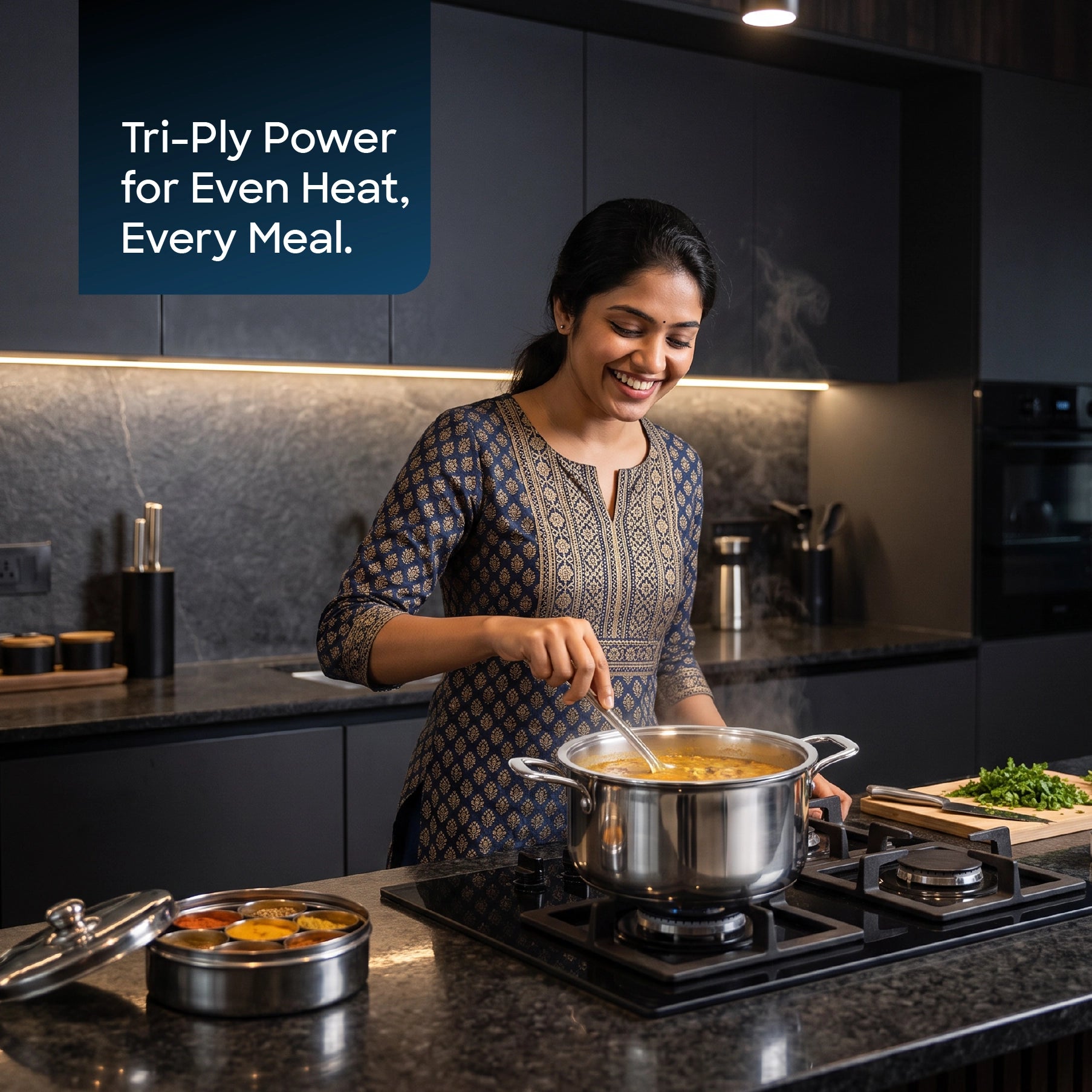 Sanford SF15213SP 24cm Tri-ply SaucePot – lifestyle shot, woman cooking in a kitchen