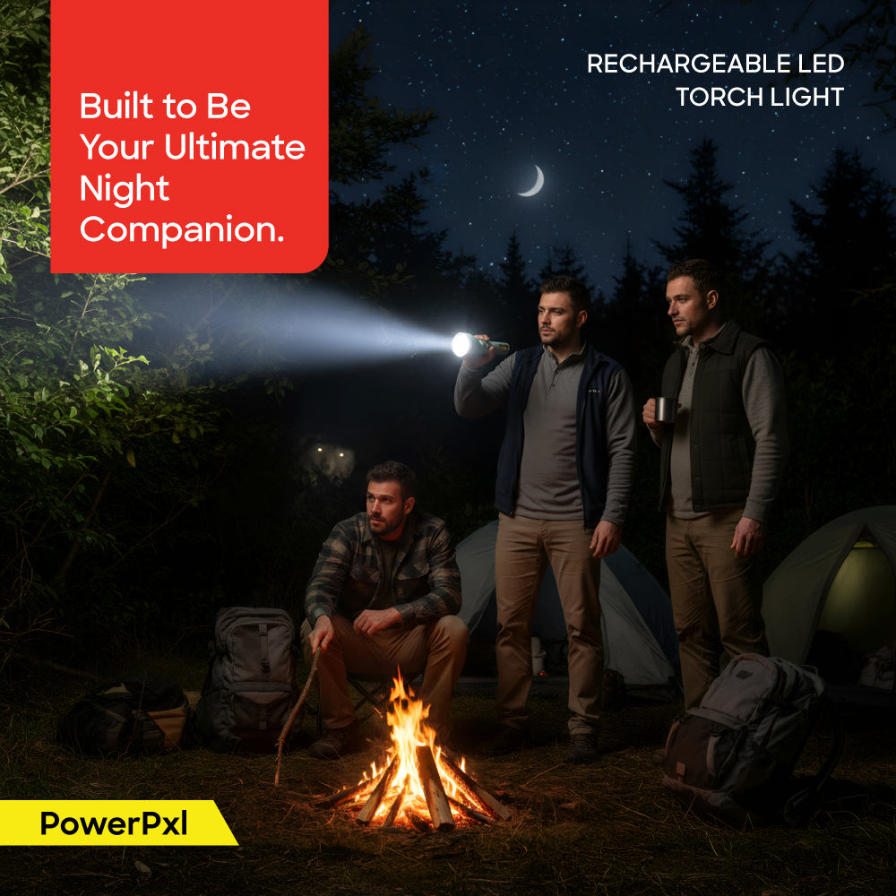 Three people camping at night with a rechargeable LED torch light, surrounded by trees and equipment.