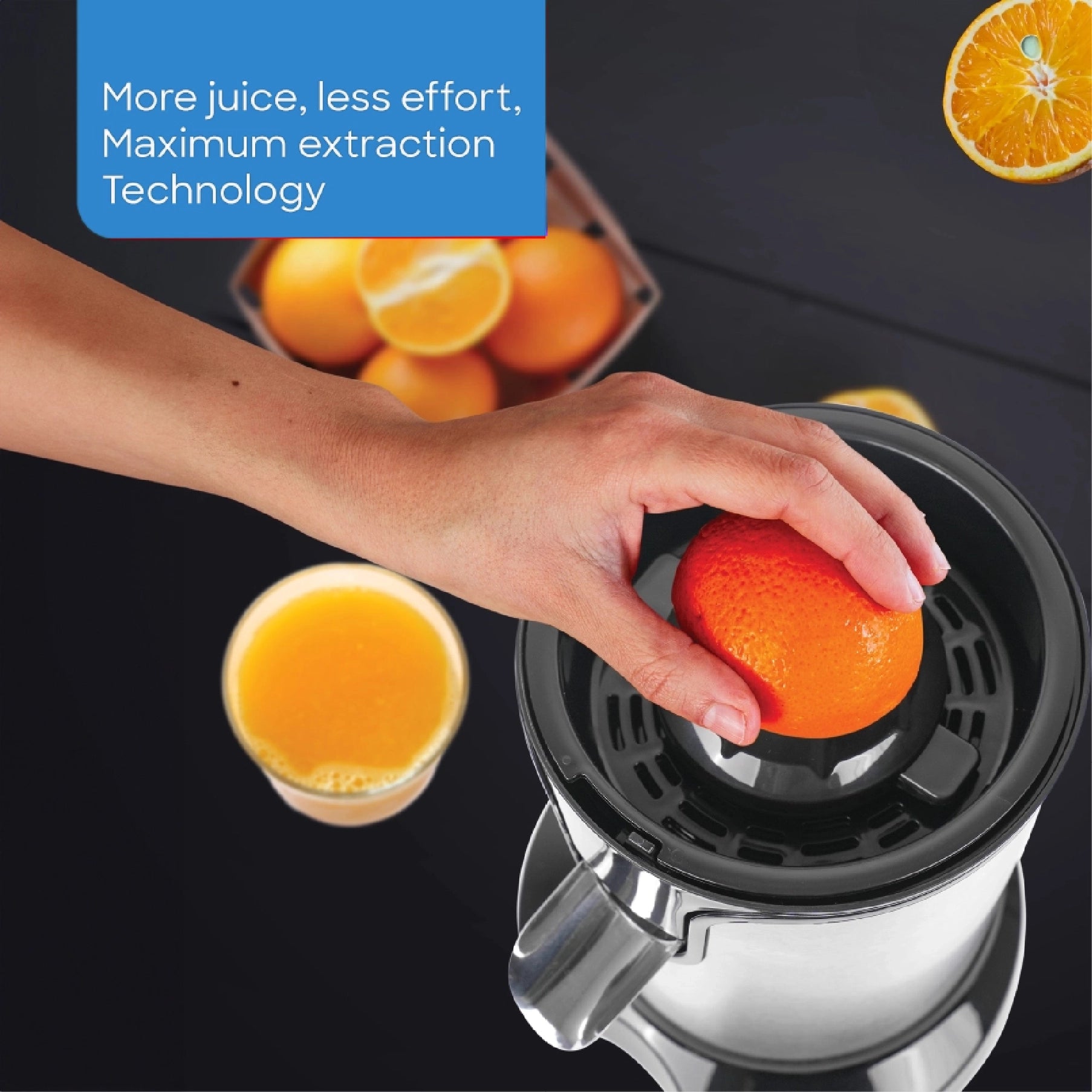 Sanford Citrus Juicer – close-up of an orange being pressed onto the juicing cone for fresh juice extraction.