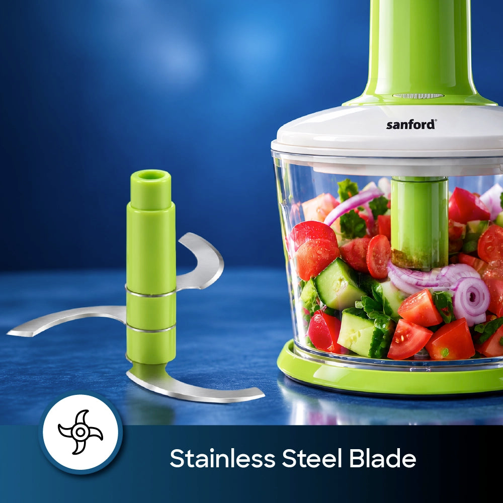 Sanford Salad Maker 3-in-1 – close-up of the stainless steel chopping blades and transparent bowl filled with chopped vegetables.